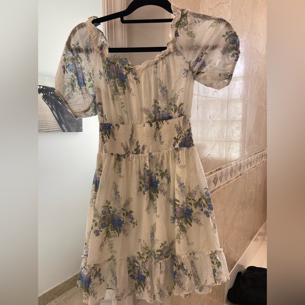 Purple flowered dress.  Cute for vacation or boating.  Newest latest dress.